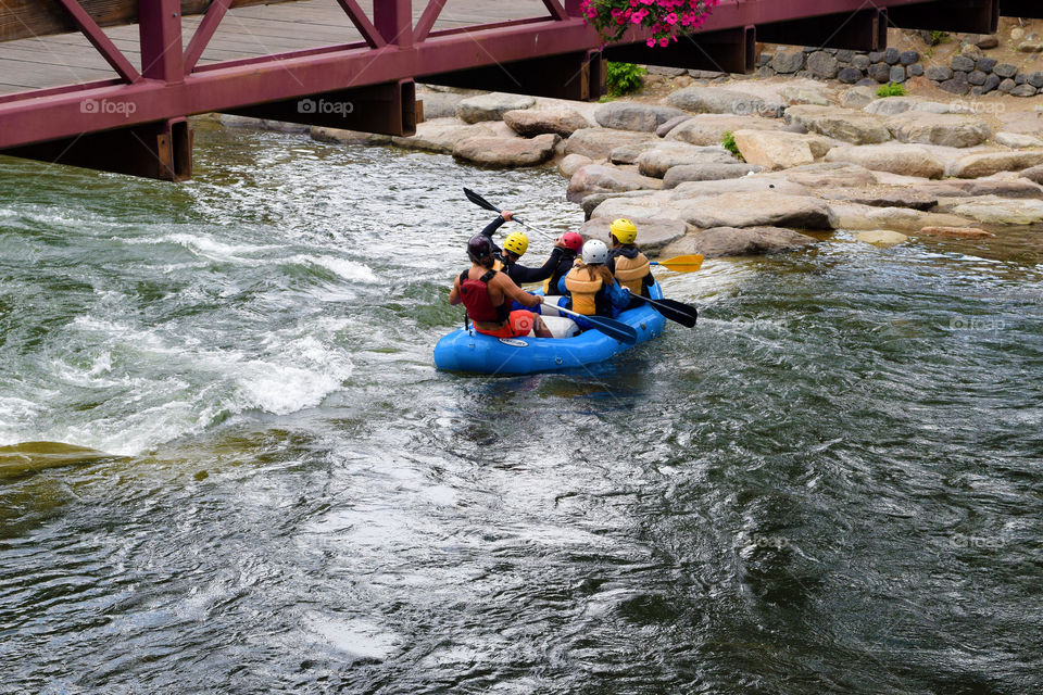 A family rafting in a river