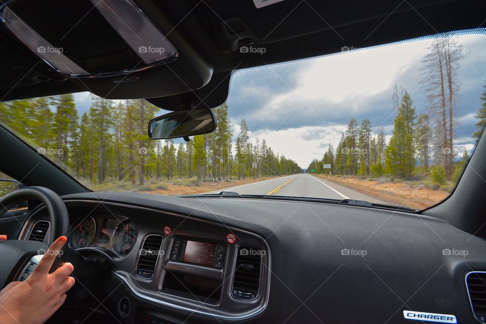 Cruising on a perfect highway towards Crater Lake in Oregon 