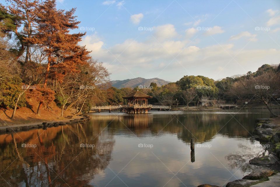 Panorama at Biwa Lake with Pavillon and autumnal leaves in Japan.