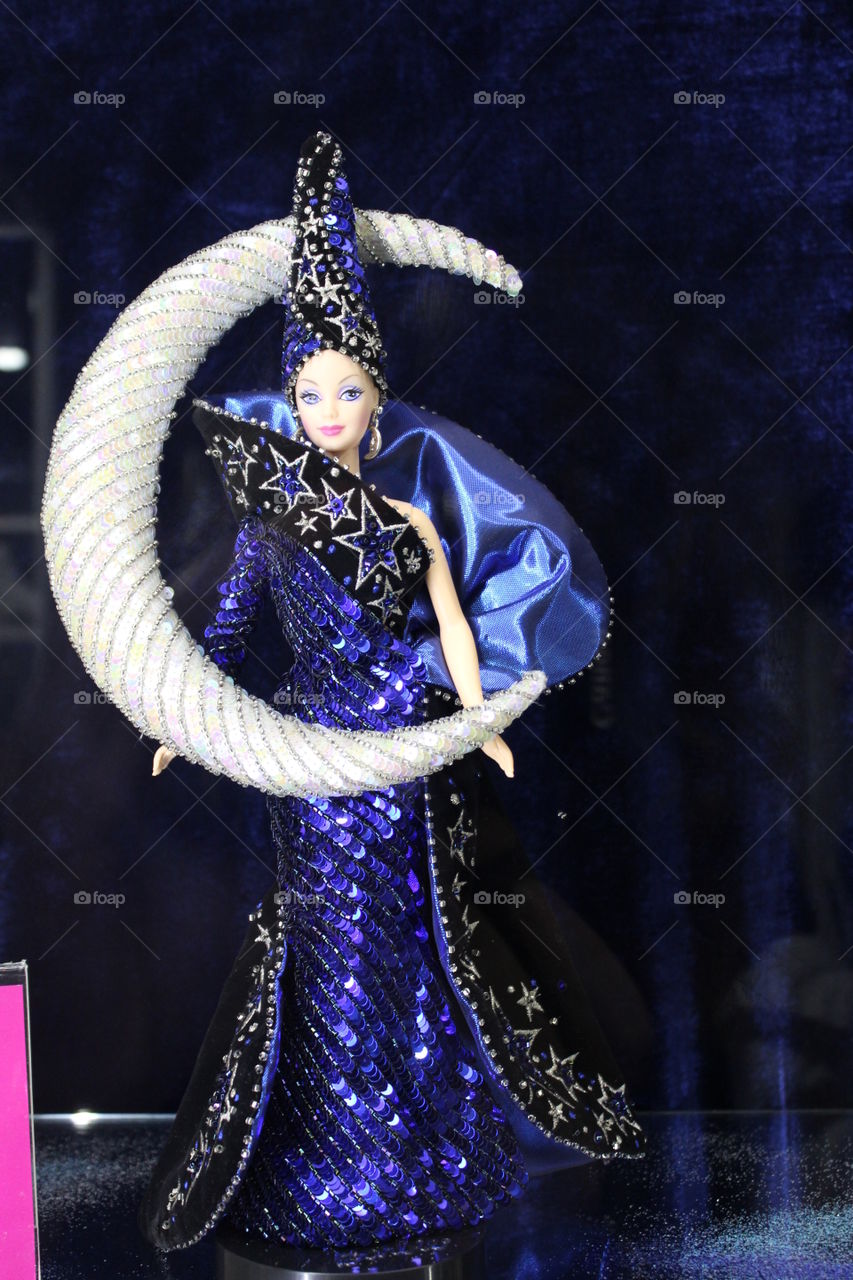 a doll in the suit of the moon goddess. exhibition of dolls. Barbie. museum.