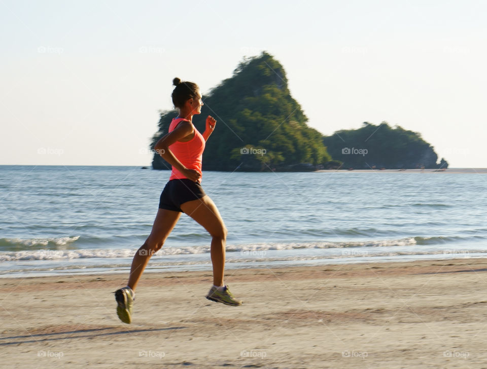 girl running on a beach