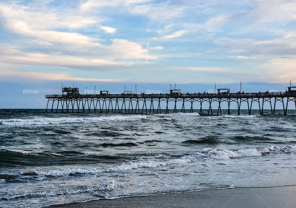 An afternoon at the beach holds the perfect view on a warm breezy day.