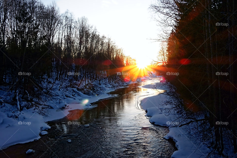 Winterly river at sundow