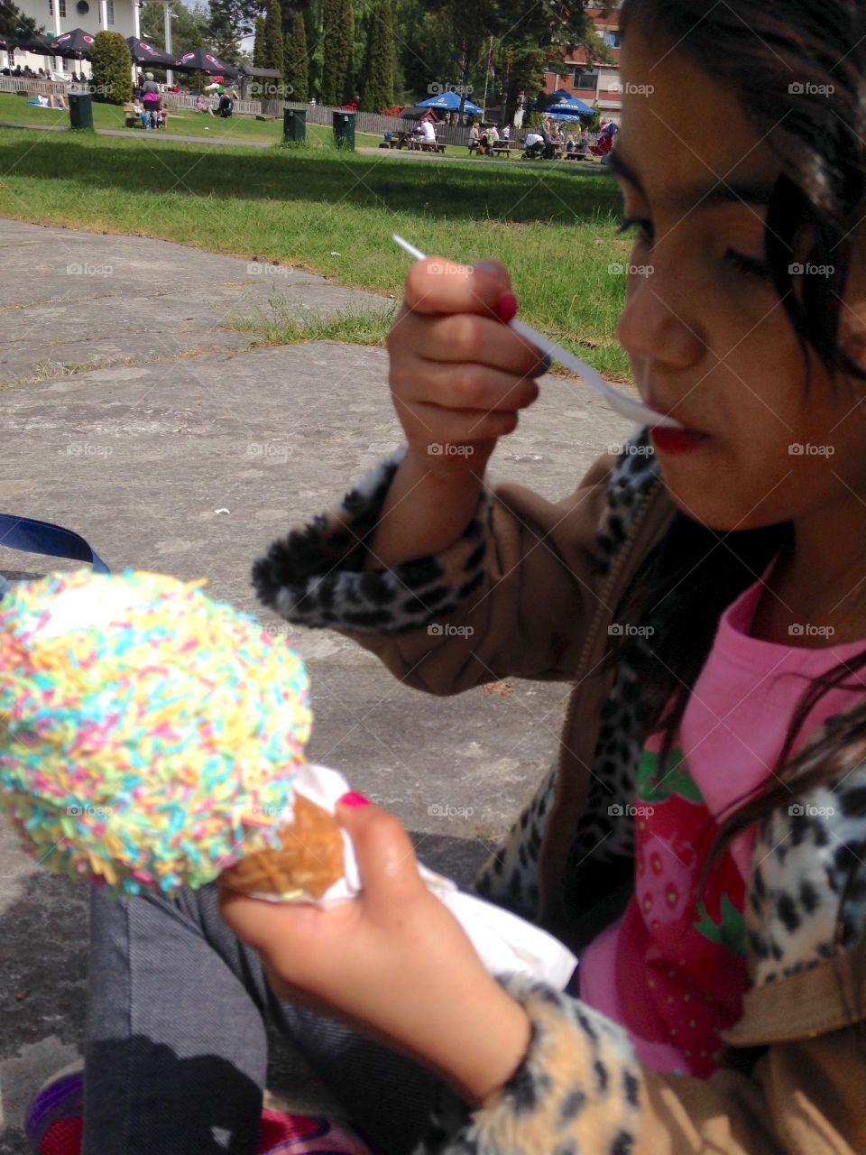 Mmmmm. Ina Could enjoy The icecream she was waiting for four hours. She ate it in few minutes cause was very hot hot day. 