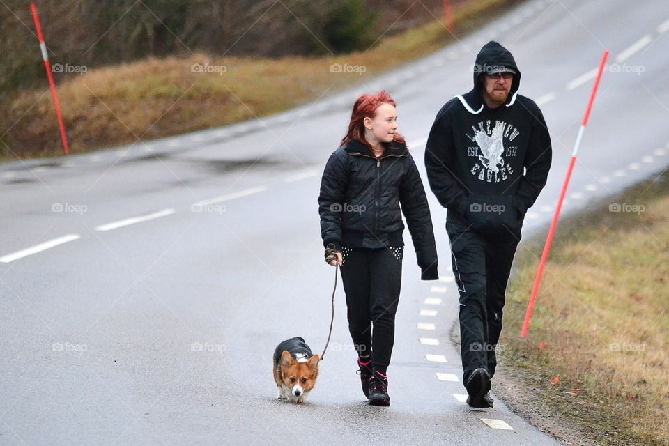 People walking with a dog