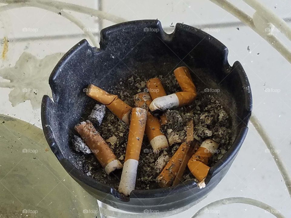 Cigarette Butts in an Ashtray