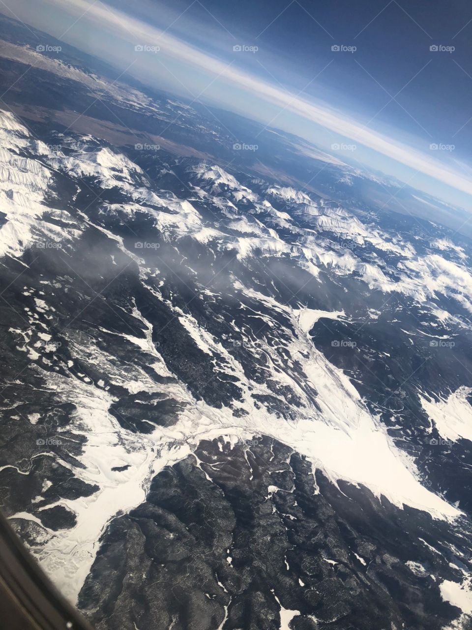Flying over to Las Vegas from New York sore this view , amazing mountain range.