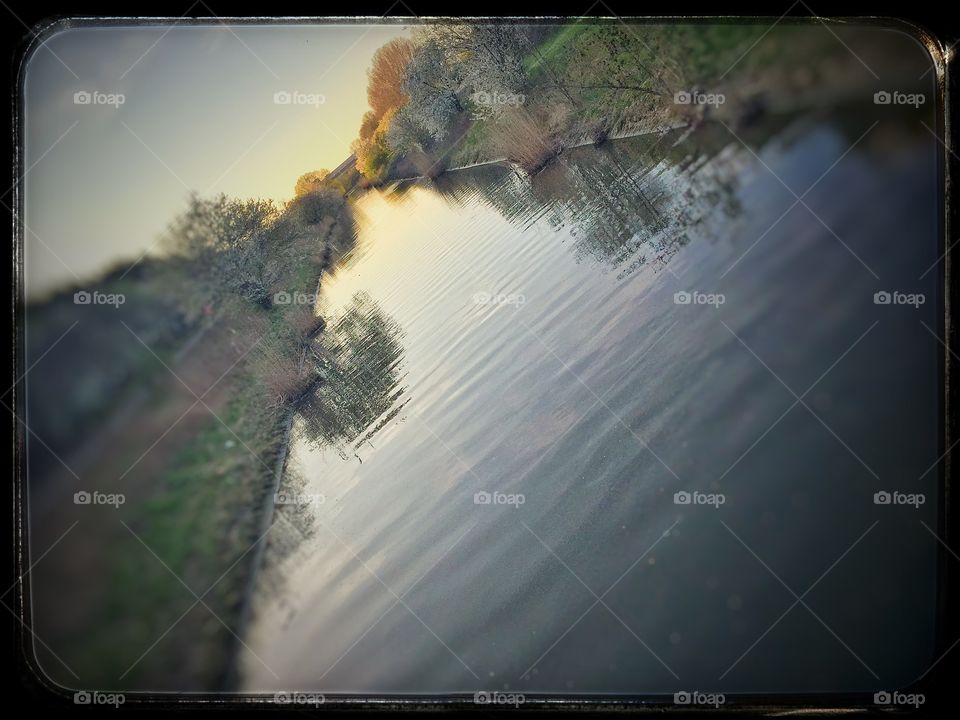 Nice evening In Denmark . Walking by the river 