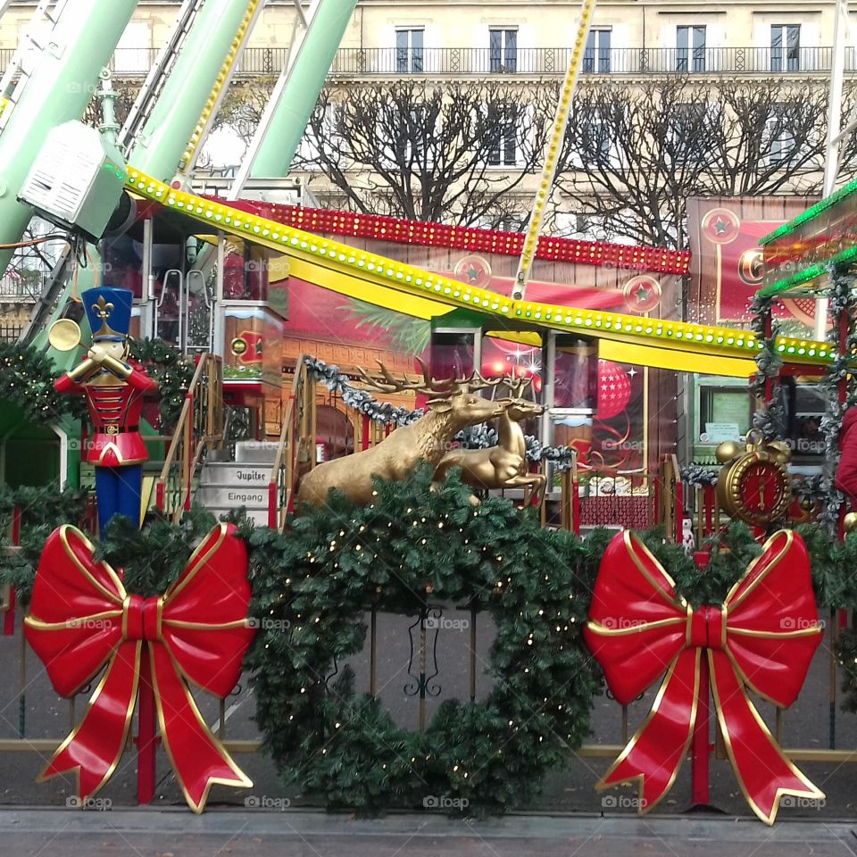 Attractions for childrens. Carousel. Red. Christmas. Paris