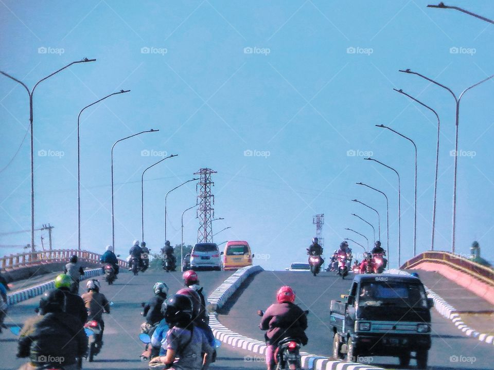 Landscape passing vehicles on the city bridge
 