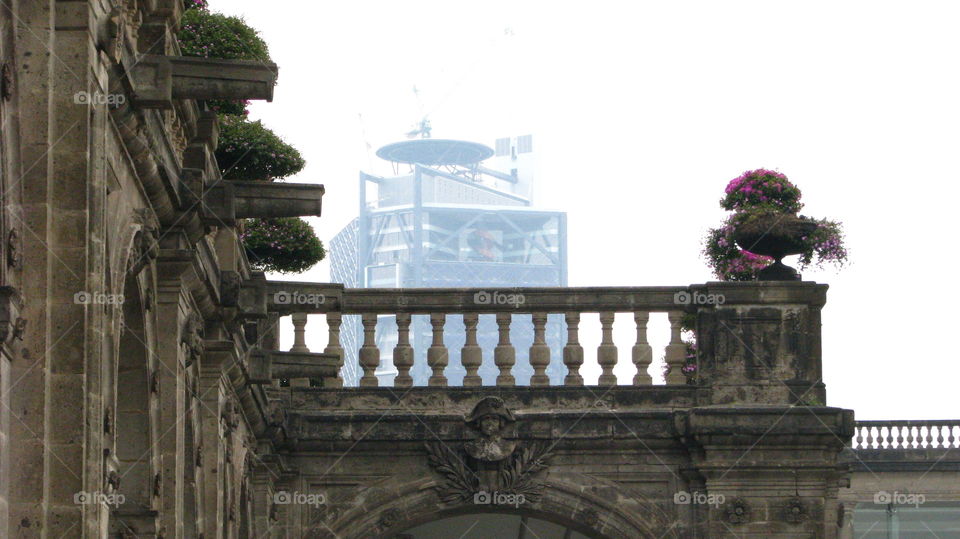 History vs. Modern . Castle Chapultepec garden, background Mayor Tower  Mexico City. 