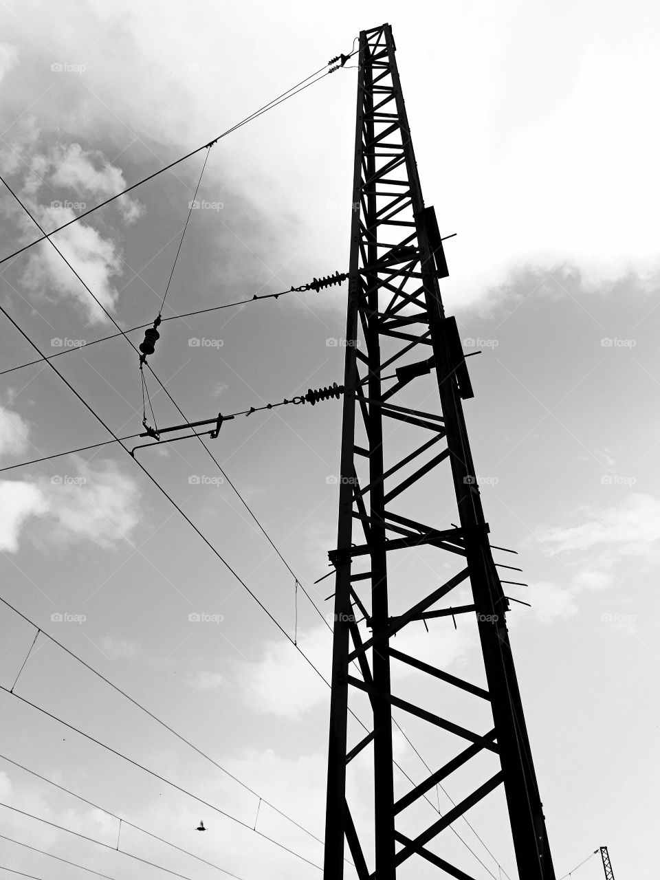 railway columns that hold contact lines above the track