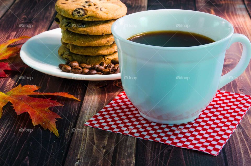 coffee been still life on wooden background