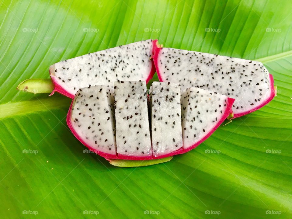 Dragon fruit on banana leaf