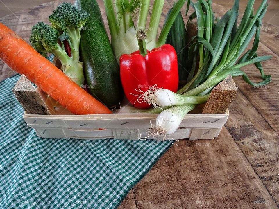 Wooden box with vegetables