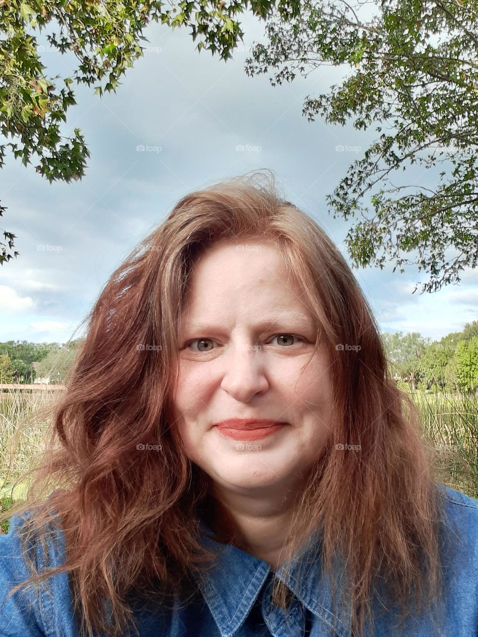 Good hair, good day. One of my favorite parks to go to is Lake Lily Park in Maitland, Florida. I took this selfie there in front of the lake.