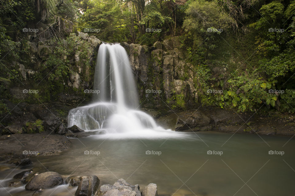 Waterfall flowing from rocks