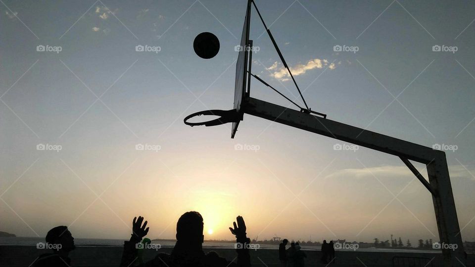 Basketball goal and team.