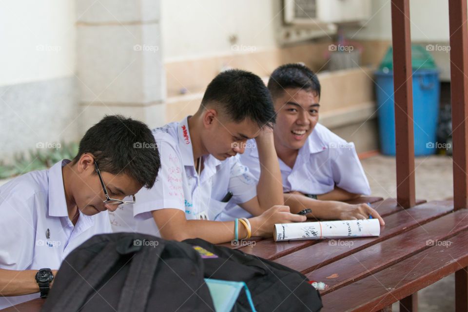 Student playing smartphone 