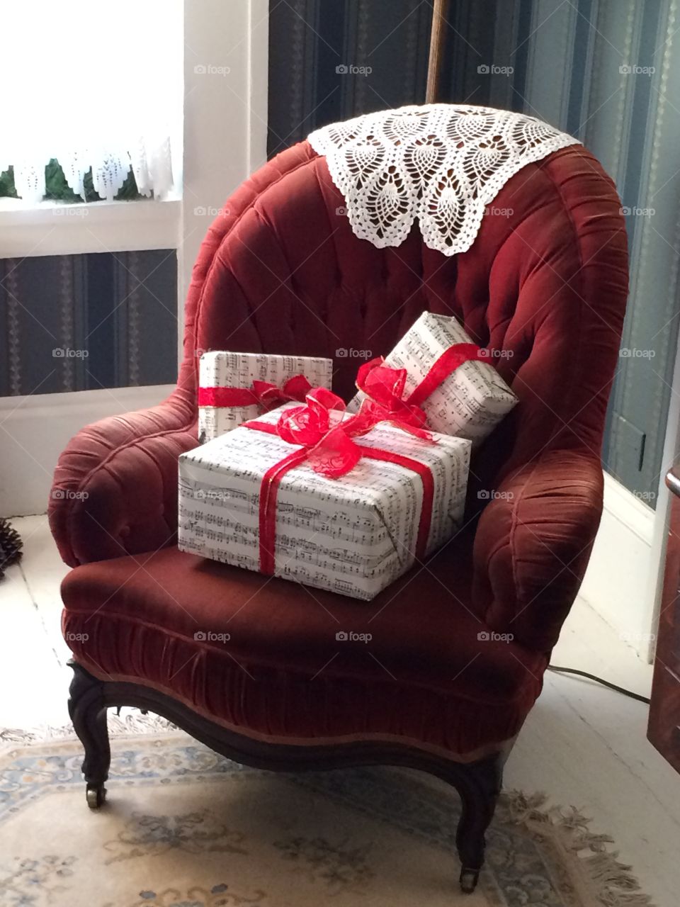 Presents on a Victorian chair.