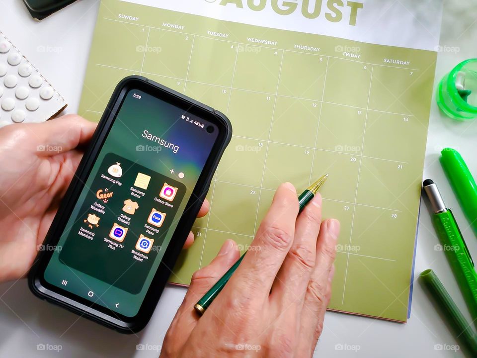 Using a Samsung cellular phone for planning.