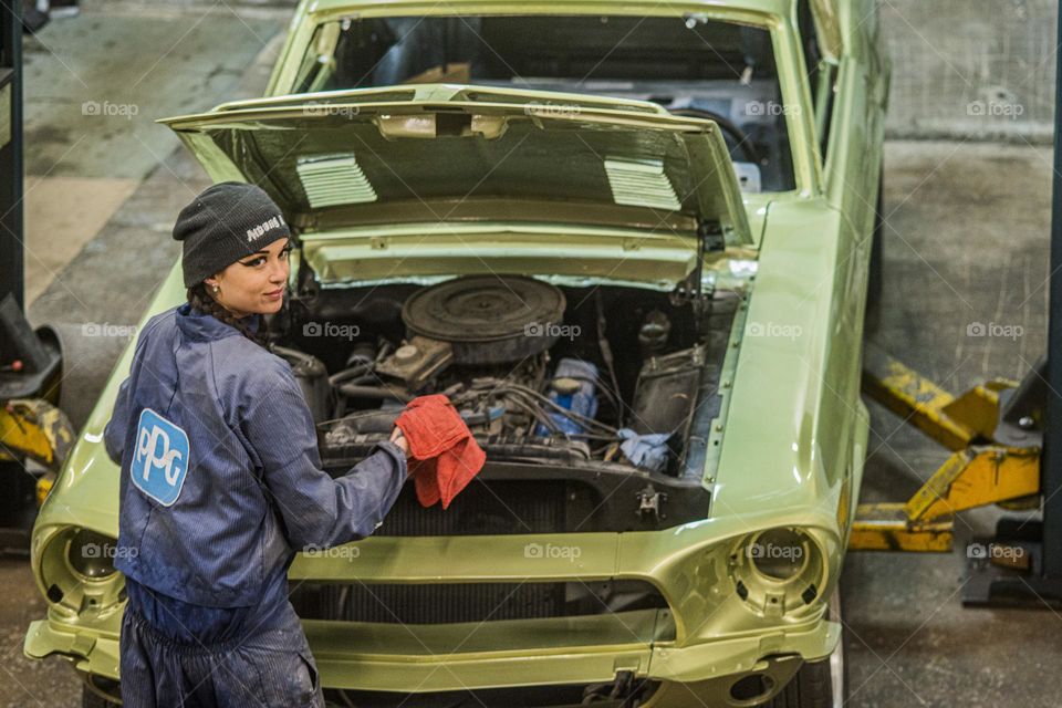 Overhead view of female mechanic 