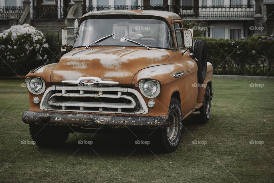 Orange vintage pick up truck 