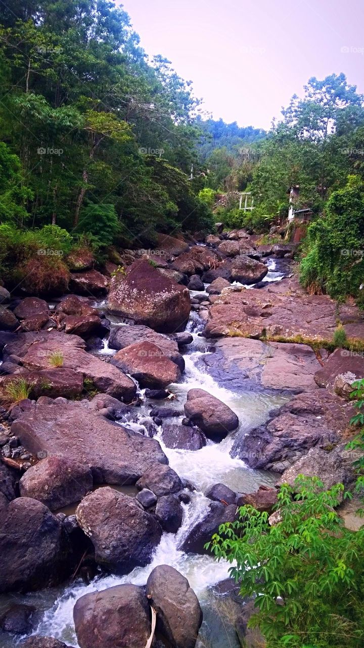 River-water flow beneath store_rocky