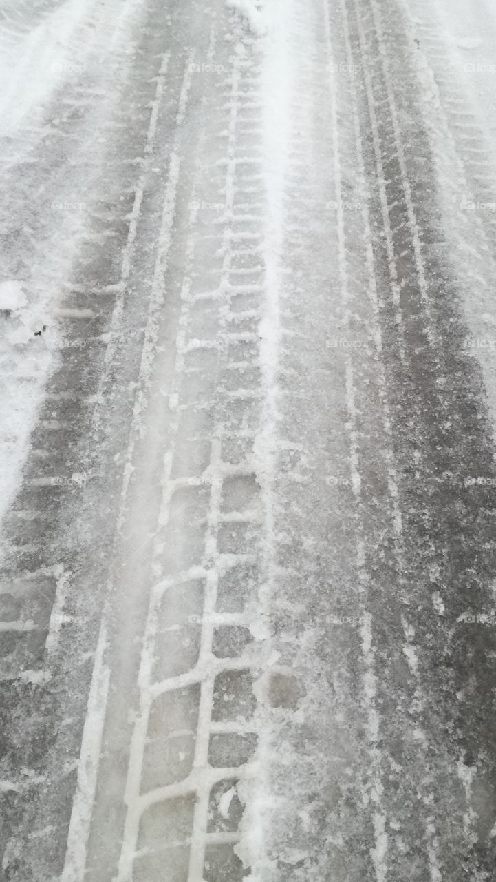 Car Wheel on Snow