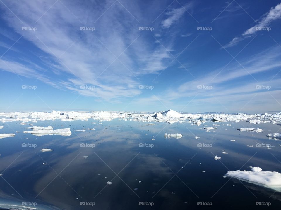 Icebergs. Sunny day on the water, Greenland