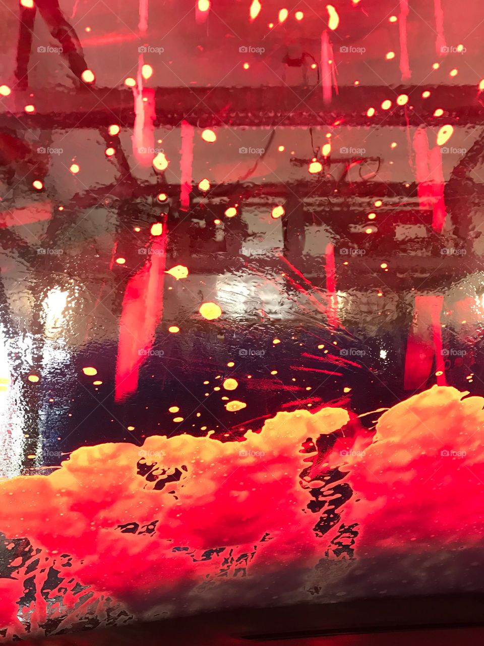Red car wash bubbles