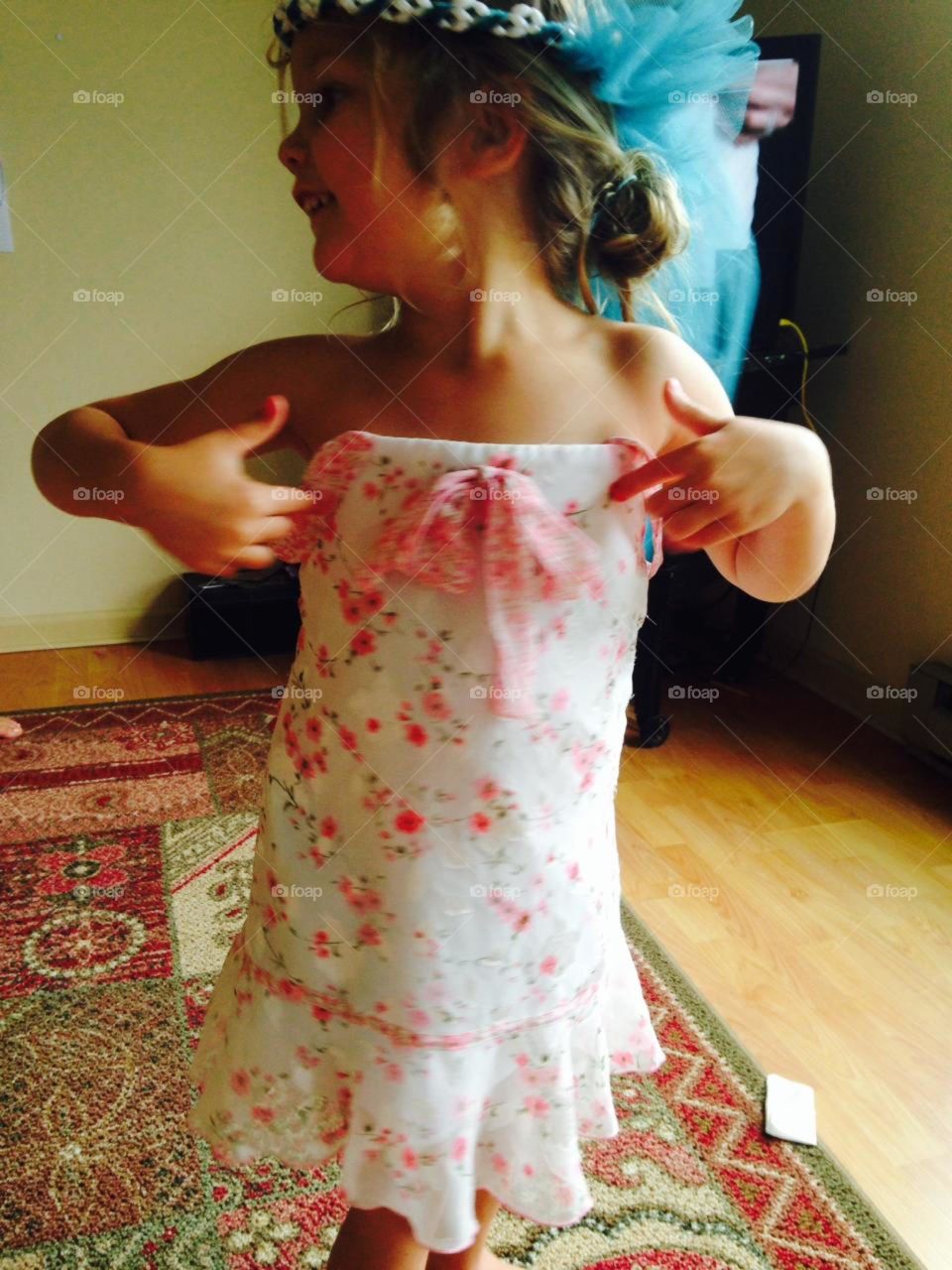 dancing granddaughter. wanted to try on a pretty dress