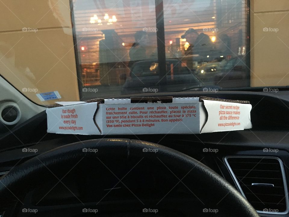 Honda Civic has the perfect shelf to put your pizza on when getting in and out of the car