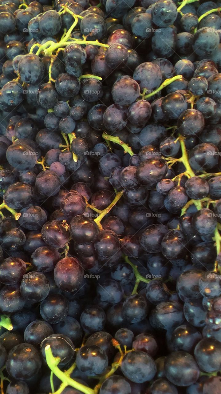 Abundence of fresh healthy sweet delicious red grapefruit in market in summer season