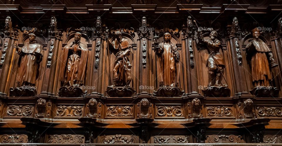 Baroque sculptures of saints in cedar and mahogany. The chorus. Malaga Cathedral. Spain.