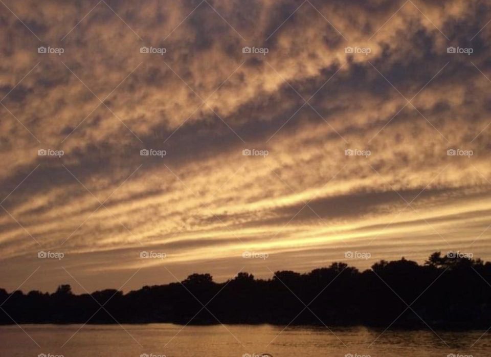 Sunset over the water