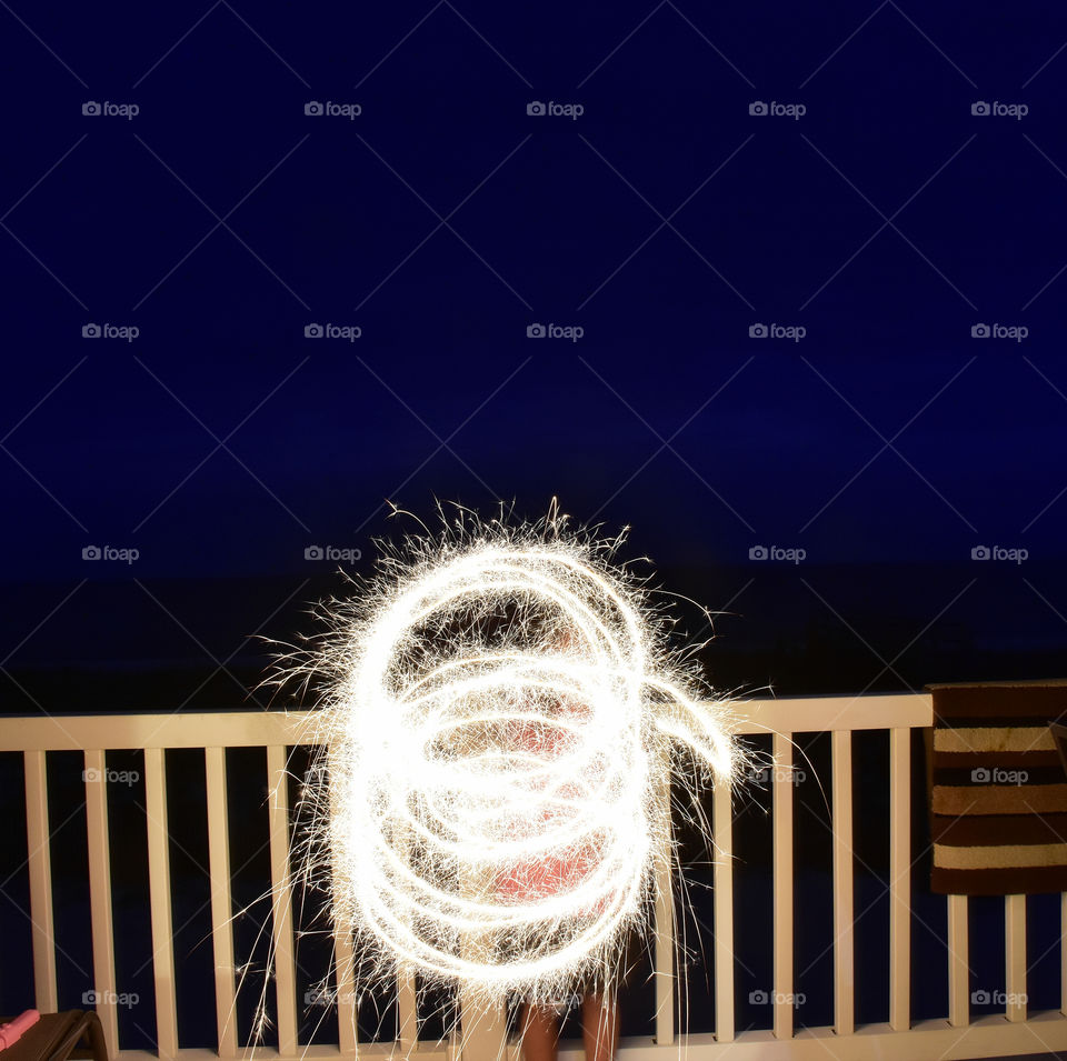 Spinning fireworks at night