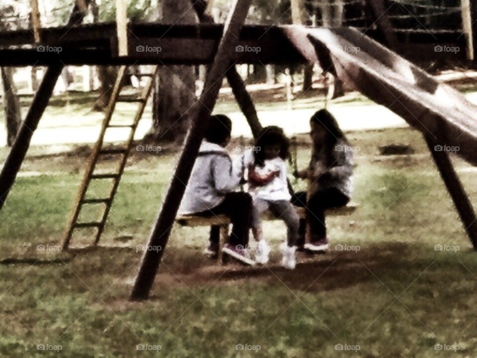 3 kids playing alone