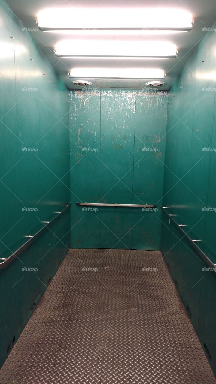 teal elevator interior