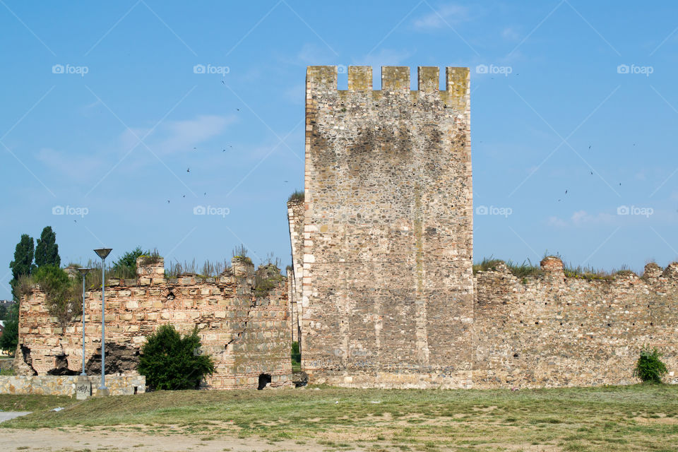 Big fortress. Two towers. It is used to defend the city from Turkish.