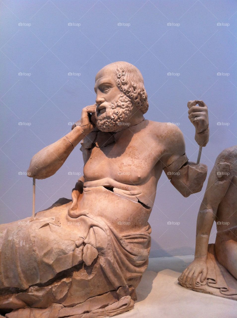 Ancient Greek sculpture on cell phone