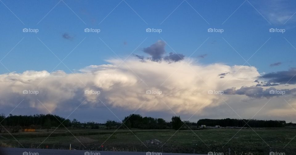 massive storm cloud in the distance