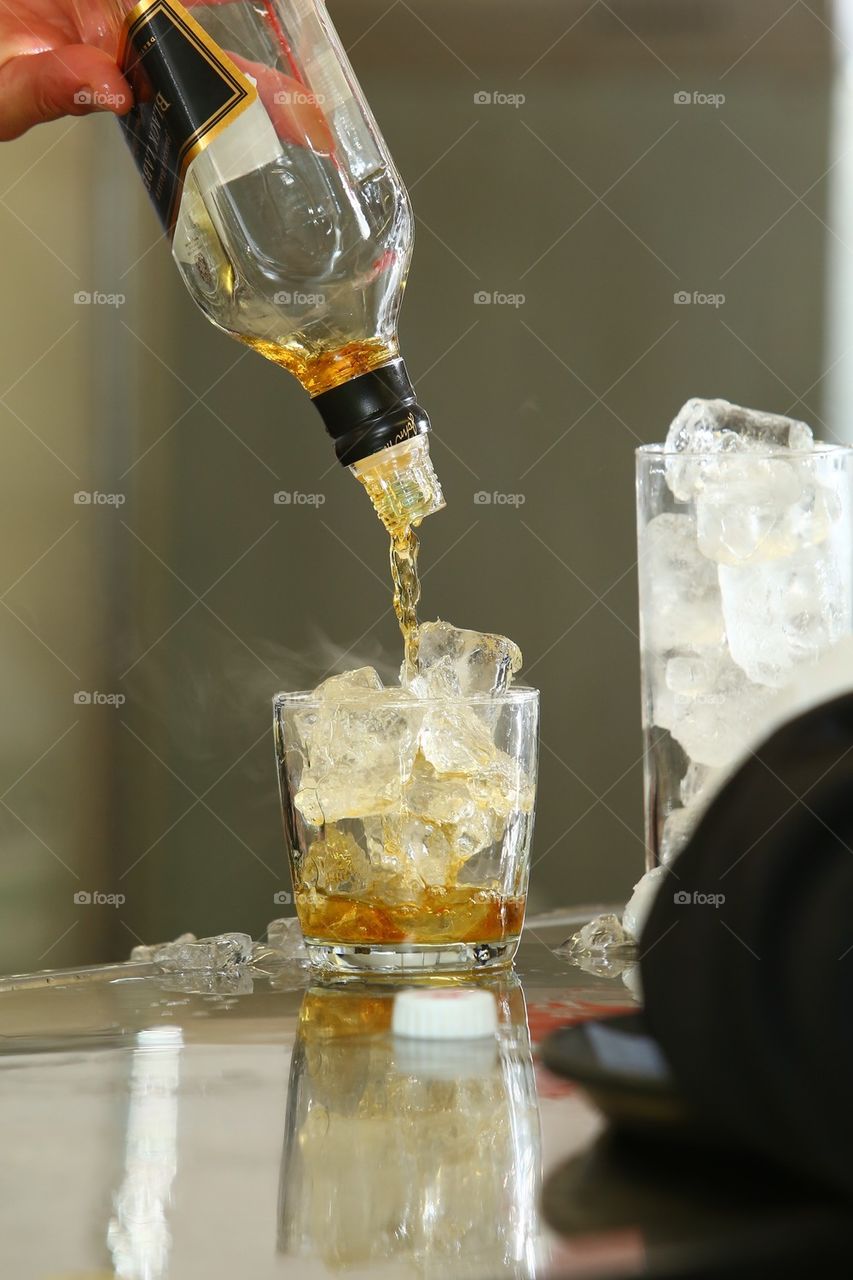 Barman serving a drink