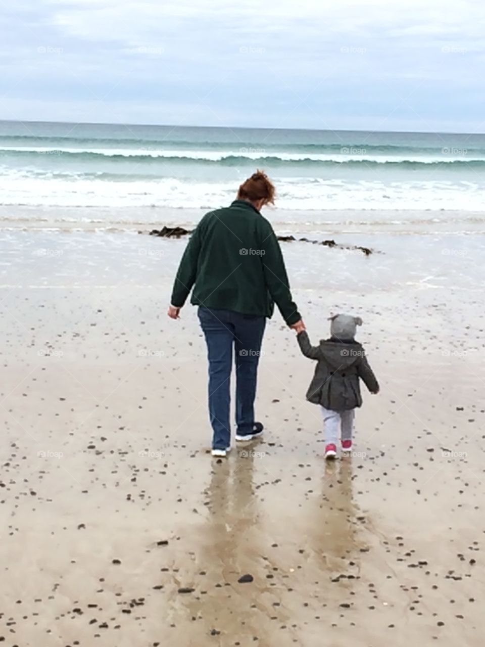 Walking on the beach with Grammy