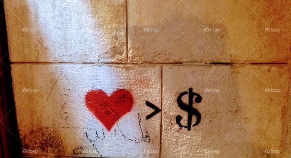 Love is more important than money. Wall graffiti art in Beirut. 