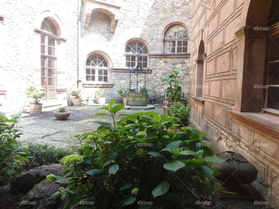 Castle courtyard and well Poland