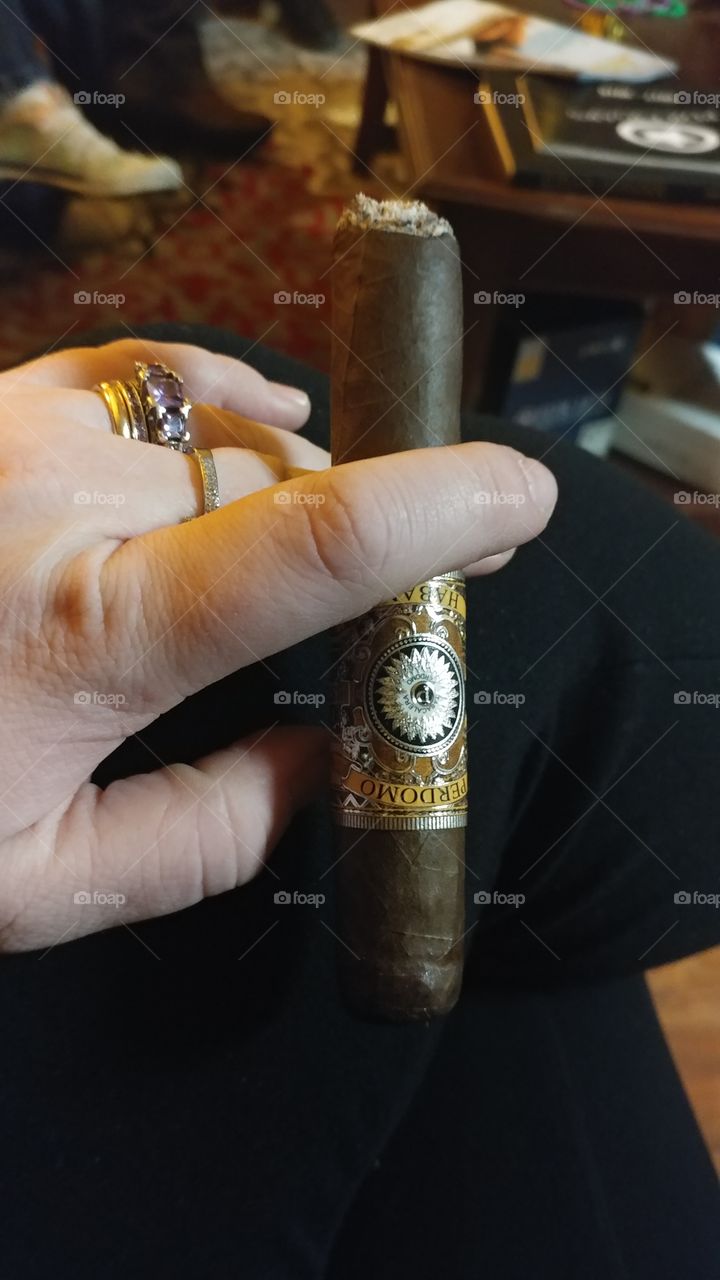 enjoying a Perdomo cigar