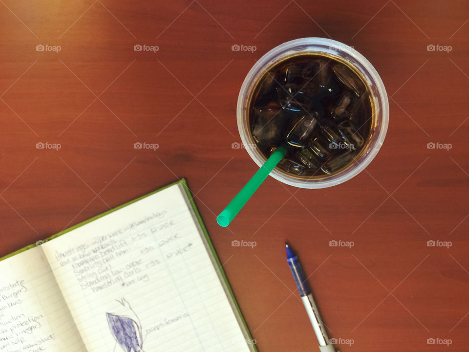 Morning Planning . Workout planning in the morning with iced coffee.