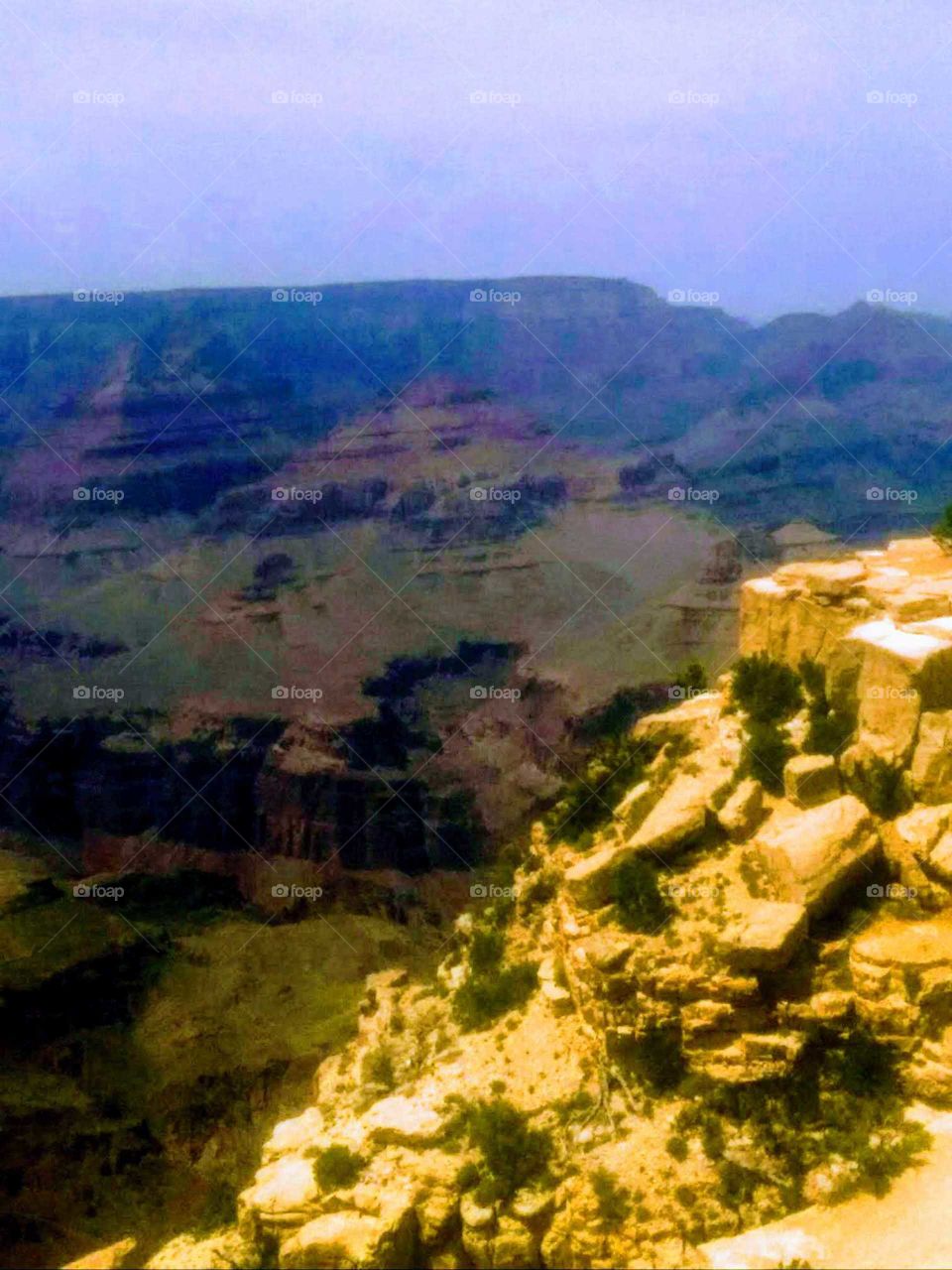 Area of Grand Canyon, with Colorado River between rocky formations