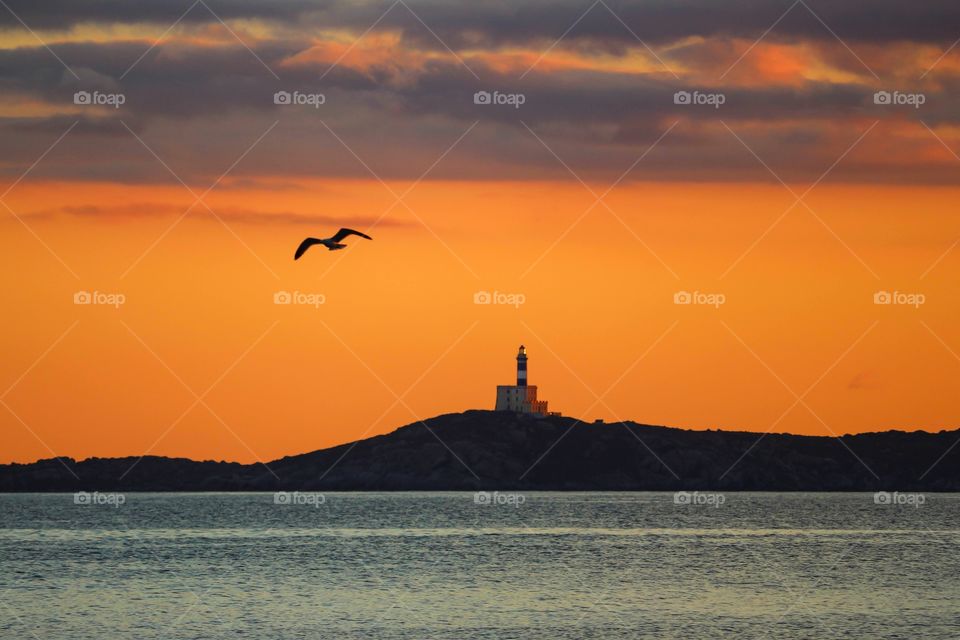 Lighthouse in the middle of the sea 